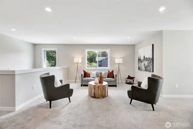 Upstairs bonus room. Previous built Peak house. Finishes may be different.