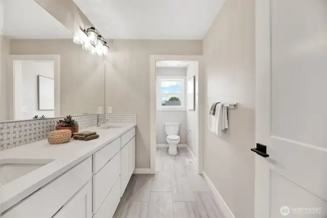 Upstairs main bathroom. Previous built Peak house. Finishes may be different.