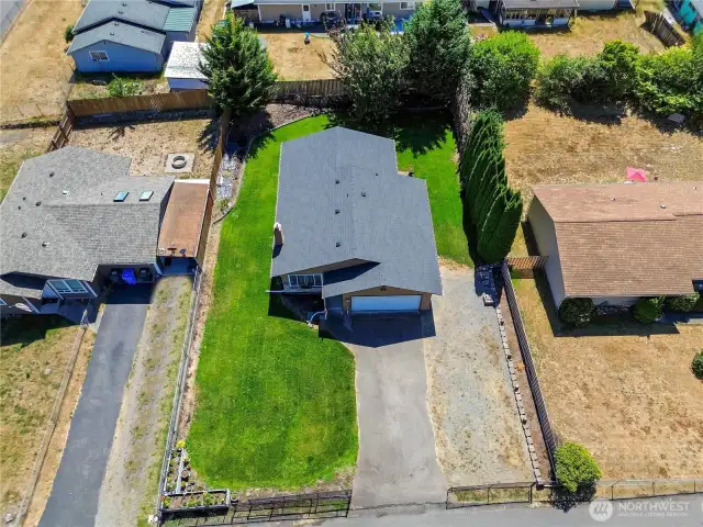 Aerial view of home with RV parking.