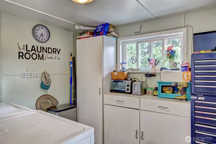 Spacious Laundry, pantry & mud room.