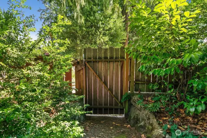 South side gate to Esat side of property.