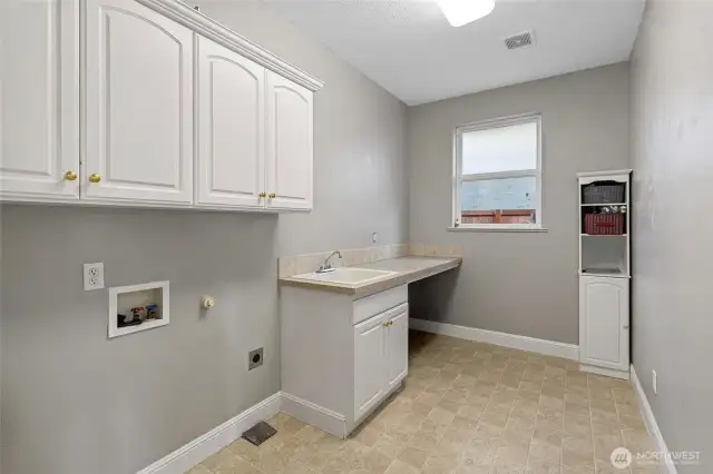 Laundry room with sink