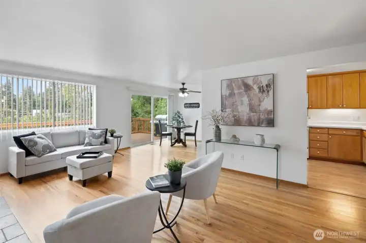 This cozy living room greets you as you come in, hardwood floors through out the upper level.