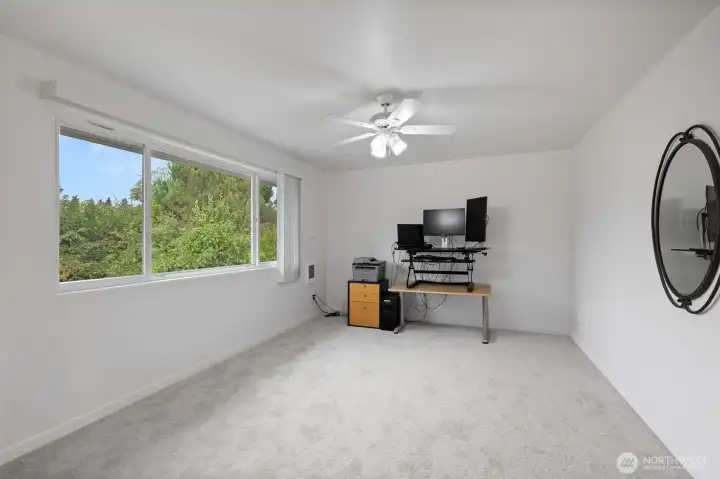 This room currently being used as an office can be a formal dining room, office, hobby room, play room, you decide.