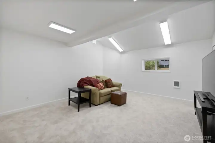 This additional space is huge and makes a great media room, bonus room. Brand new carpet finishes it off.