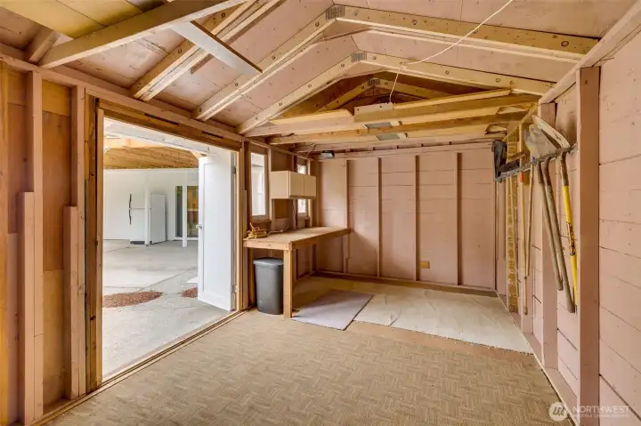 Double French doors make it easy to move things in and out. Just steps to the lower level sliding door.