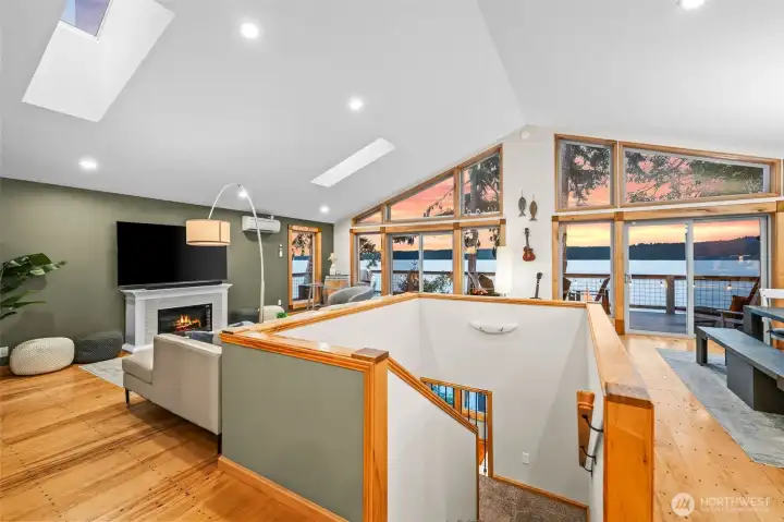 Central stairs take you down to second story bedrooms and basement flex room.