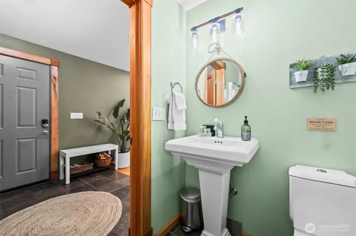 Powder bathroom for your guests include a shower (not seen)