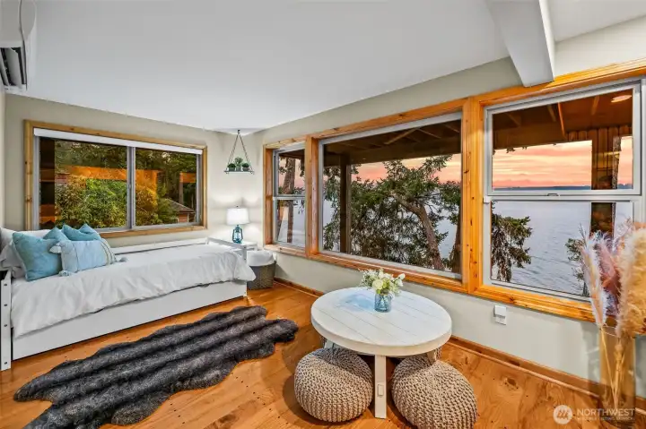 Flex den just outside the primary bedroom has front row seats to your eastern facing views of Hood Canal.