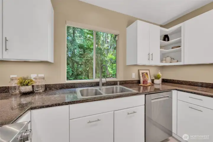 Lots of storage including a deep walk-in pantry around the corner