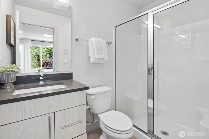 Ensuite bath attached to ground floor guest bedroom.