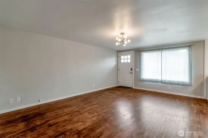 Front door. Original hardwood floors in all rooms