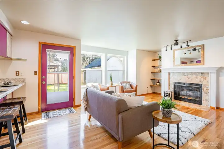 Family room/greatroom with cozy fireplace.