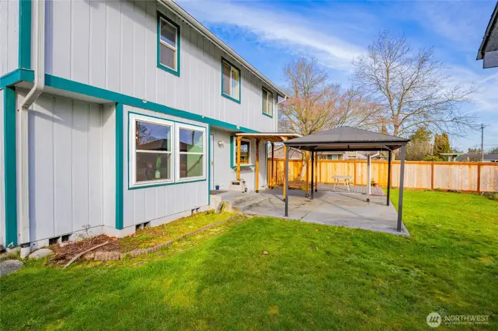 Covered patio, gazebo and additional deck area is ready for entertaining.