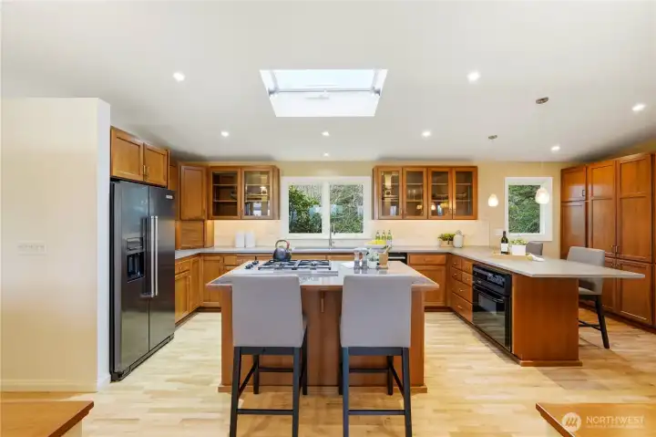 A view of the kitchen from the living area, showcasing the home's open, connected layout.