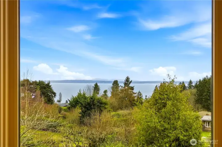 Views of the sound, mountains and surrounding landscape from the sunroom.