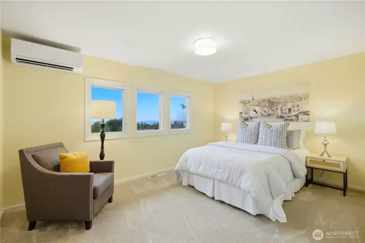 One of three upstairs bedrooms, with views of the sound and mountains.
