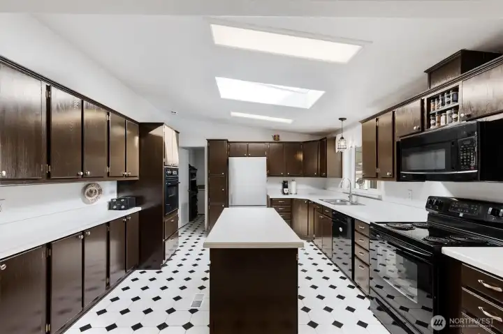Kitchen with Island and Skylights.