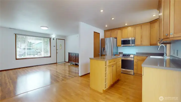 View from dining room looking to the kitchen and onto the living room