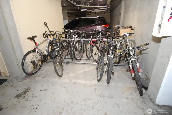 Two separate secure bicycle/scooter storage in garage