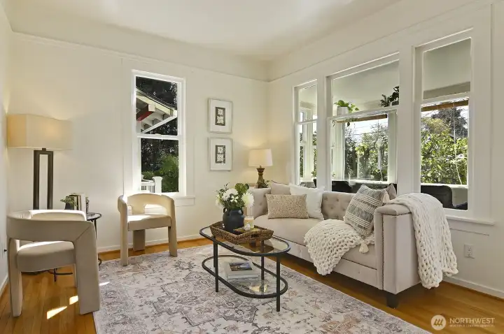 Charming living room with hardwood floors.