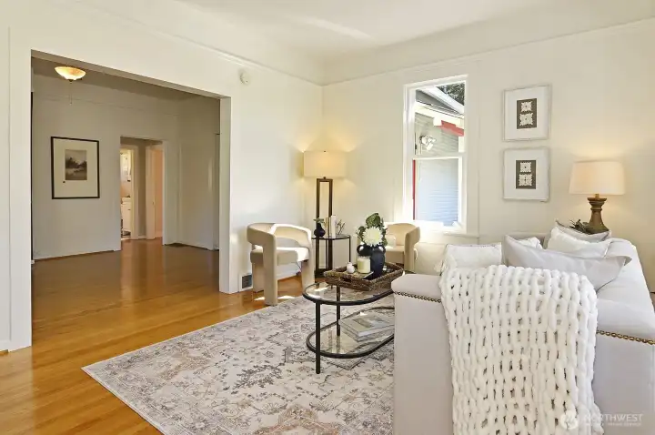 Charming living room with hardwood floors.