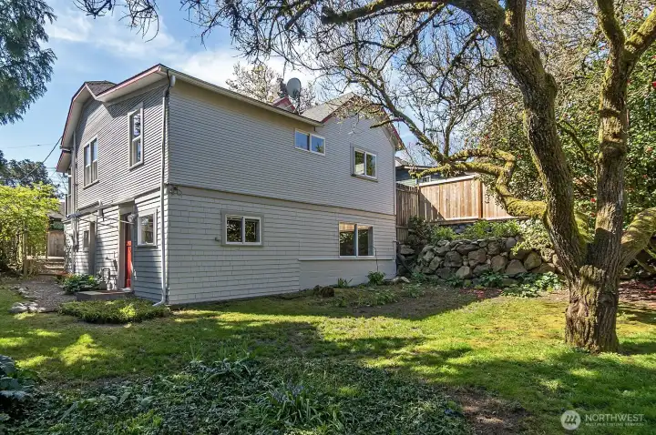 Huge 6100 sq ft lot with plenty of space for recreation and possible DADU expansion.