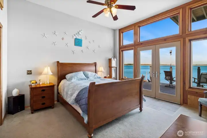 Wake to panoramic views and literally only steps to the water's edge.