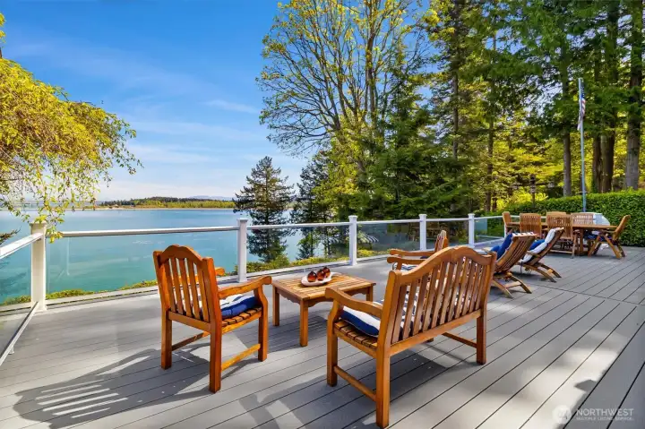 An expansive 800 sq foot TREX deck with aluminum/glass railing to capture these stunning views.