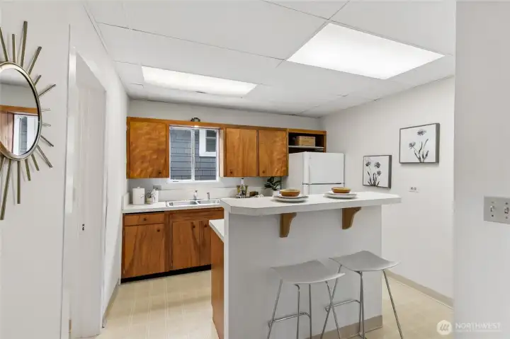 Drop ceiling removable, full ceiling height is the same as rest of the house.