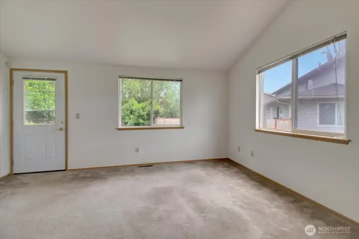 Lots of natural light in the living area with door to rear patio Lots of natural light in the living area with door to rear patio