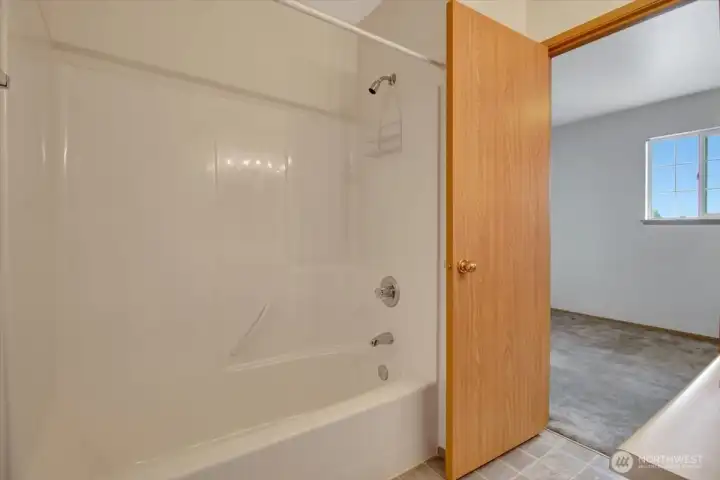 Tub & shower in upstairs bathroom Tub & shower in upstairs bathroom