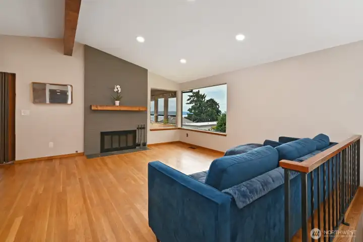 Refinished hardwood floors and gas fireplace. Refinished hardwood floors and gas fireplace.
