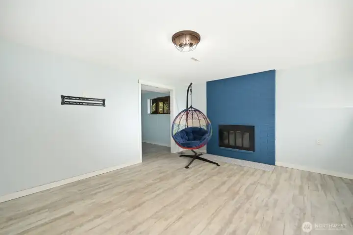 Family room with a small room off to the left, good for storage. Family room with a small room off to the left, good for storage.