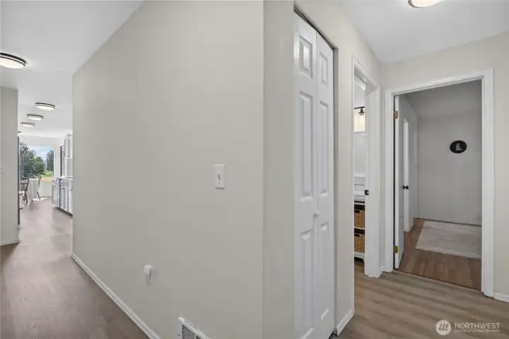 Hallway leading to the primary straight ahead, 3/4 bath to the left and 2nd bedroom on the right Hallway leading to the primary straight ahead, 3/4 bath to the left and 2nd bedroom on the right