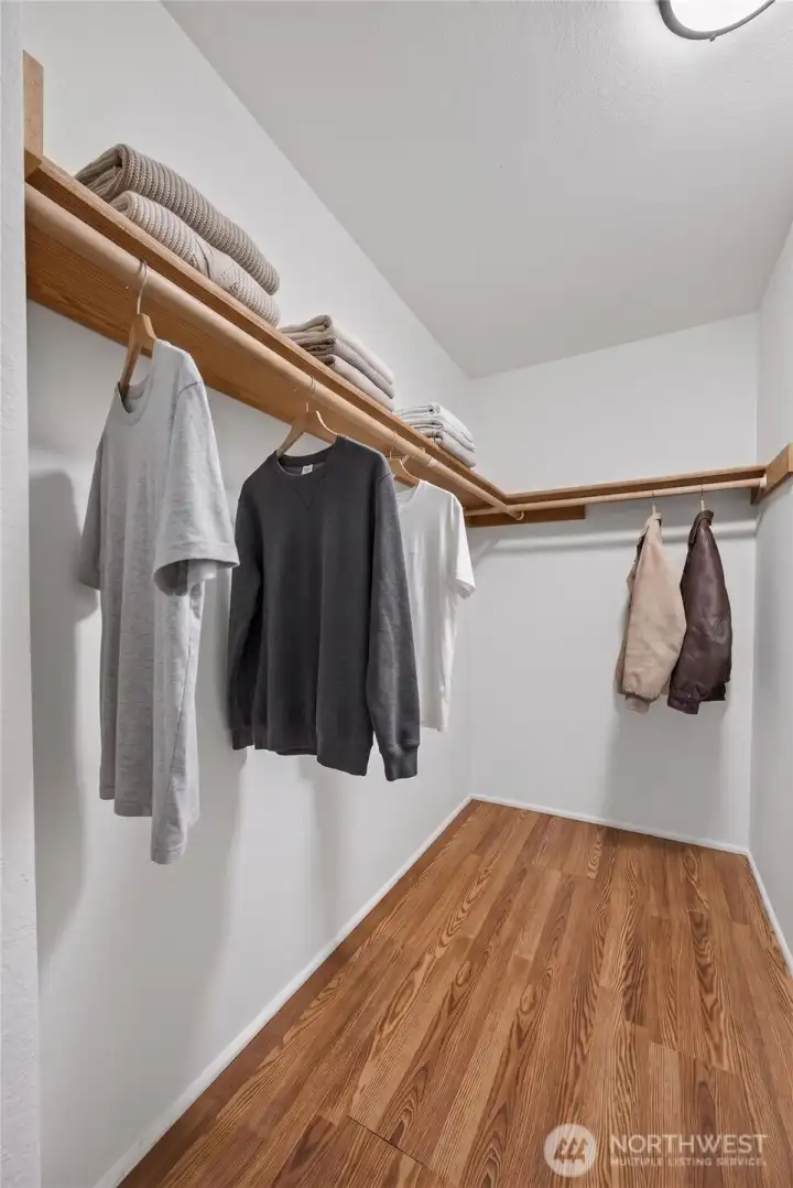 Primary walk-in closet Primary walk-in closet