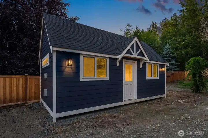 A spacious shed wired for power. A spacious shed wired for power.