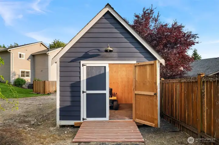 Other side of shed has storage space for tools, riding lawn mower, etc. Other side of shed has storage space for tools, riding lawn mower, etc.