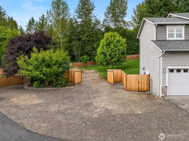 Large space off house for RV parking or other vehicles. Large space off house for RV parking or other vehicles.
