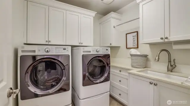 Utility room with tons of built-in custom cabinetry