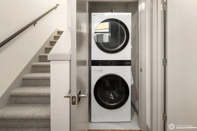 Full size LG W/D unit located near the primary bedroom.