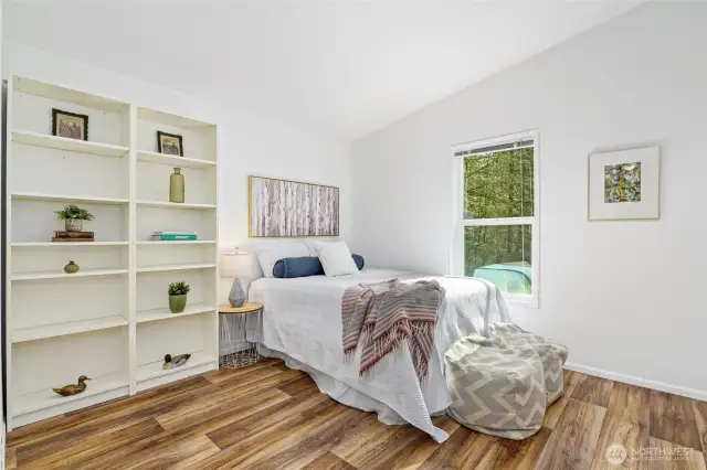 Bedroom three, like all the bedrooms, features a spacious closet for ample storage.