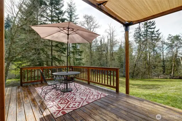 The front deck offers versatile enjoyment, with one end open to the sky for sunbathing, letting natural light into the home, or stargazing after an evening meal.