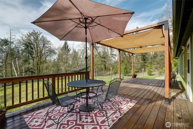 From the open end of the deck, looking north, the sunshade is simple to install or remove and includes optional side 'walls' for added privacy and shade.