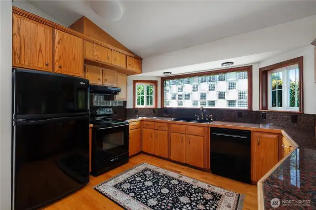 Unique glass block window in kitchen.