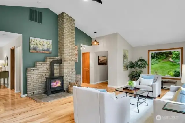 Living room with wood fireplace.