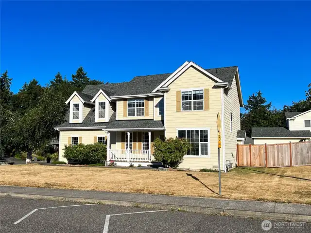 Large, level corner lot with fully fenced back yard.