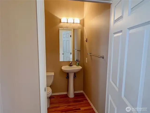 Conveniently located half bath off the front foyer.