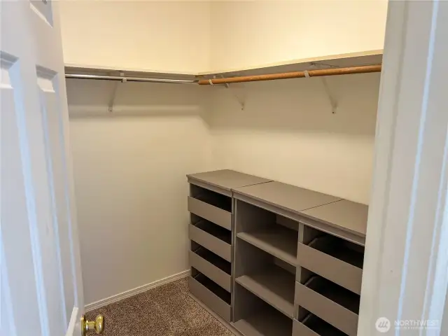 Handy drawers and shelves in the walk in closet.