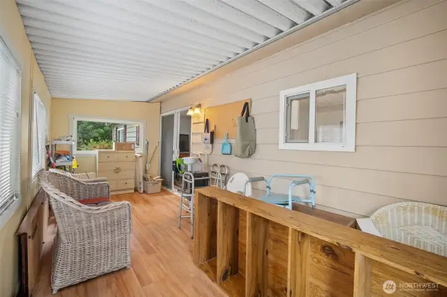 Sunroom/ Enclosed porch is great for extra storage space!